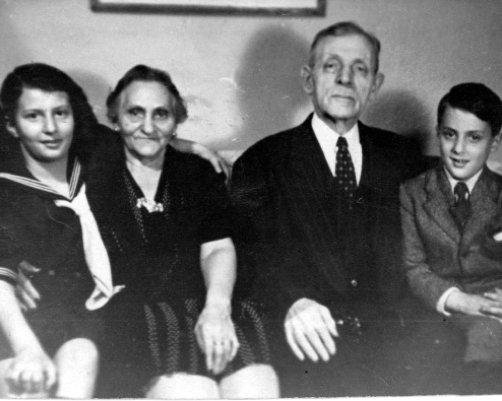Dan and Sue with their grandparents in an early family photograph