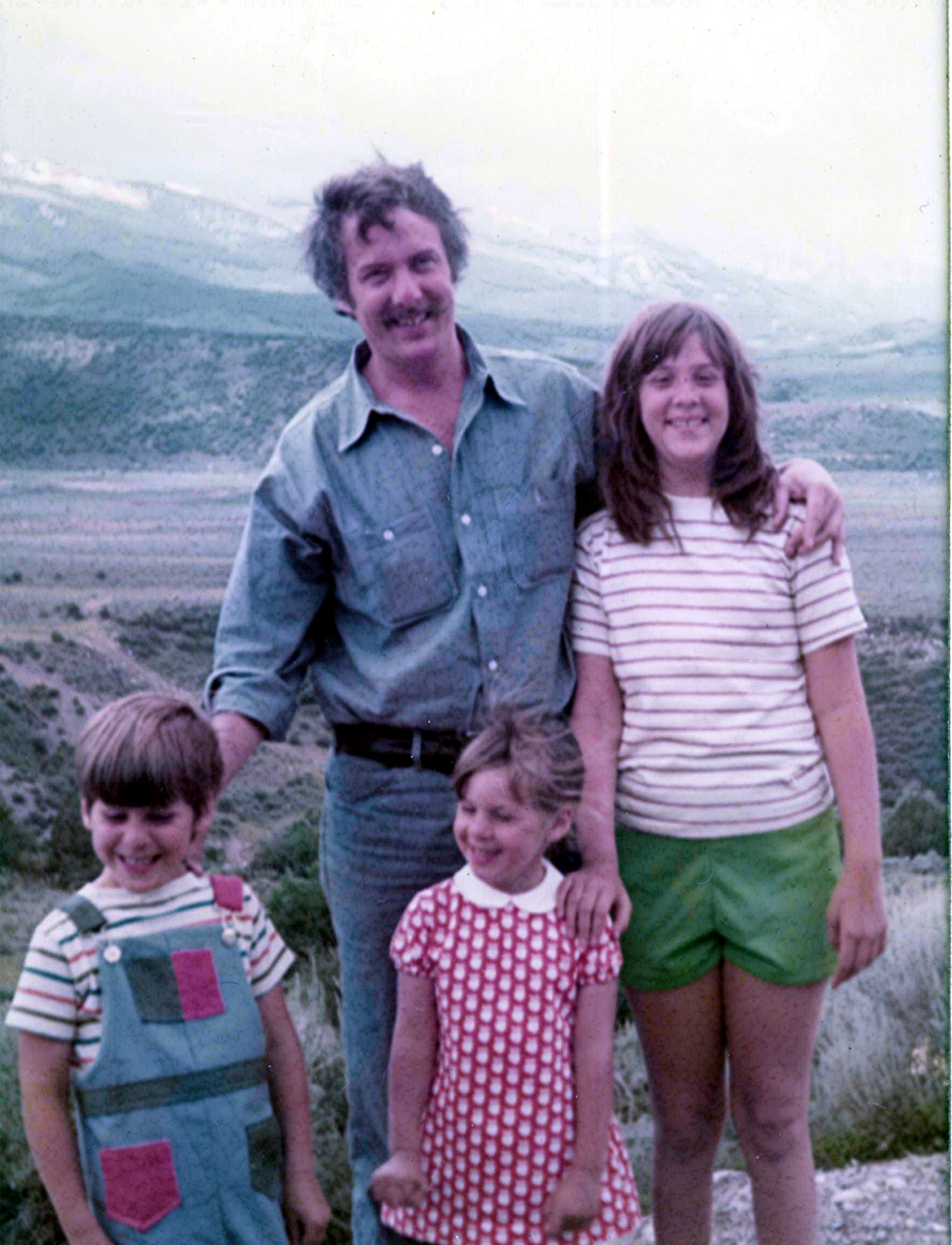Marshall with his children during the family’s first trip to Colorado