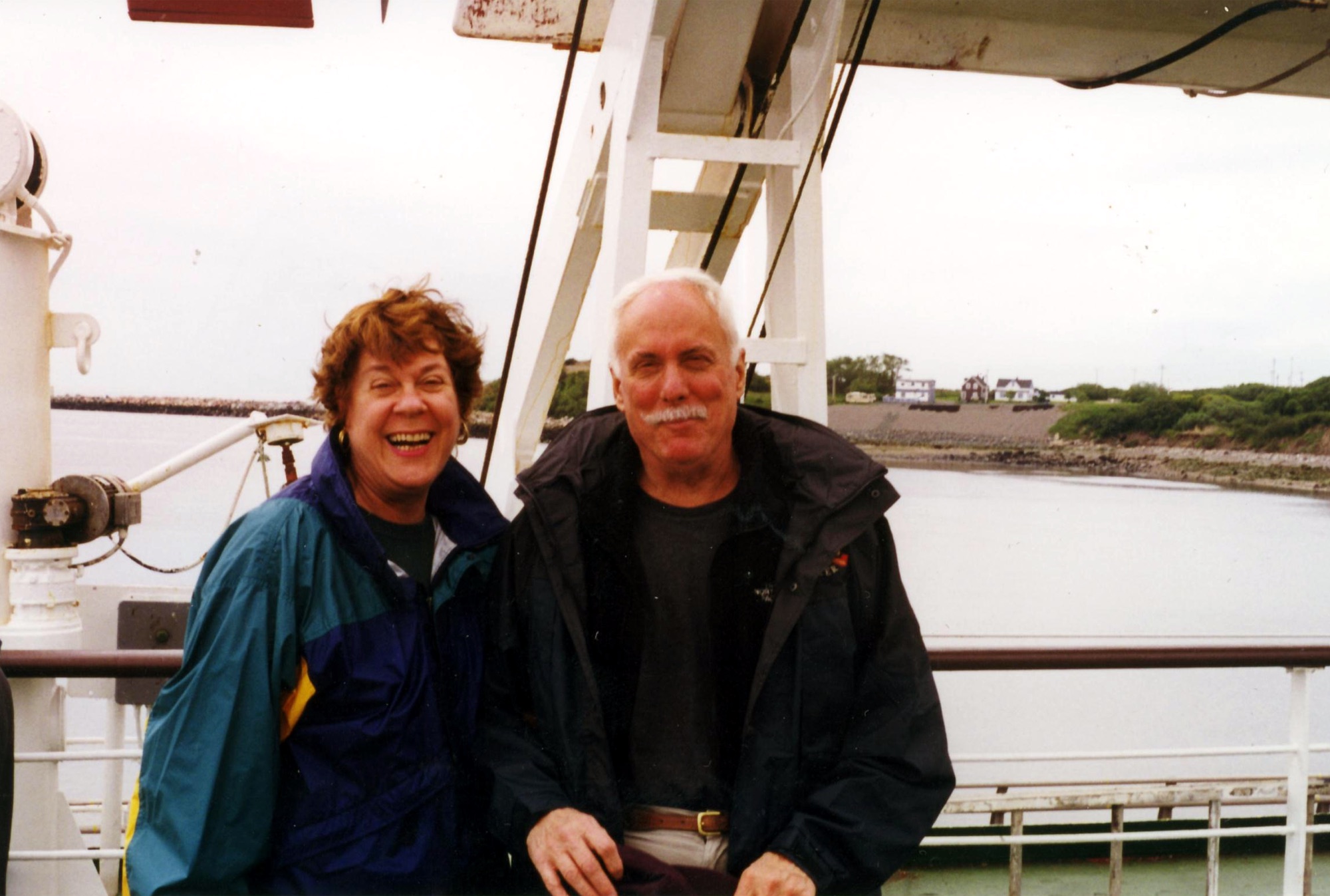 Marshall and Marian traveling by boat in Nova Scotia in 1999