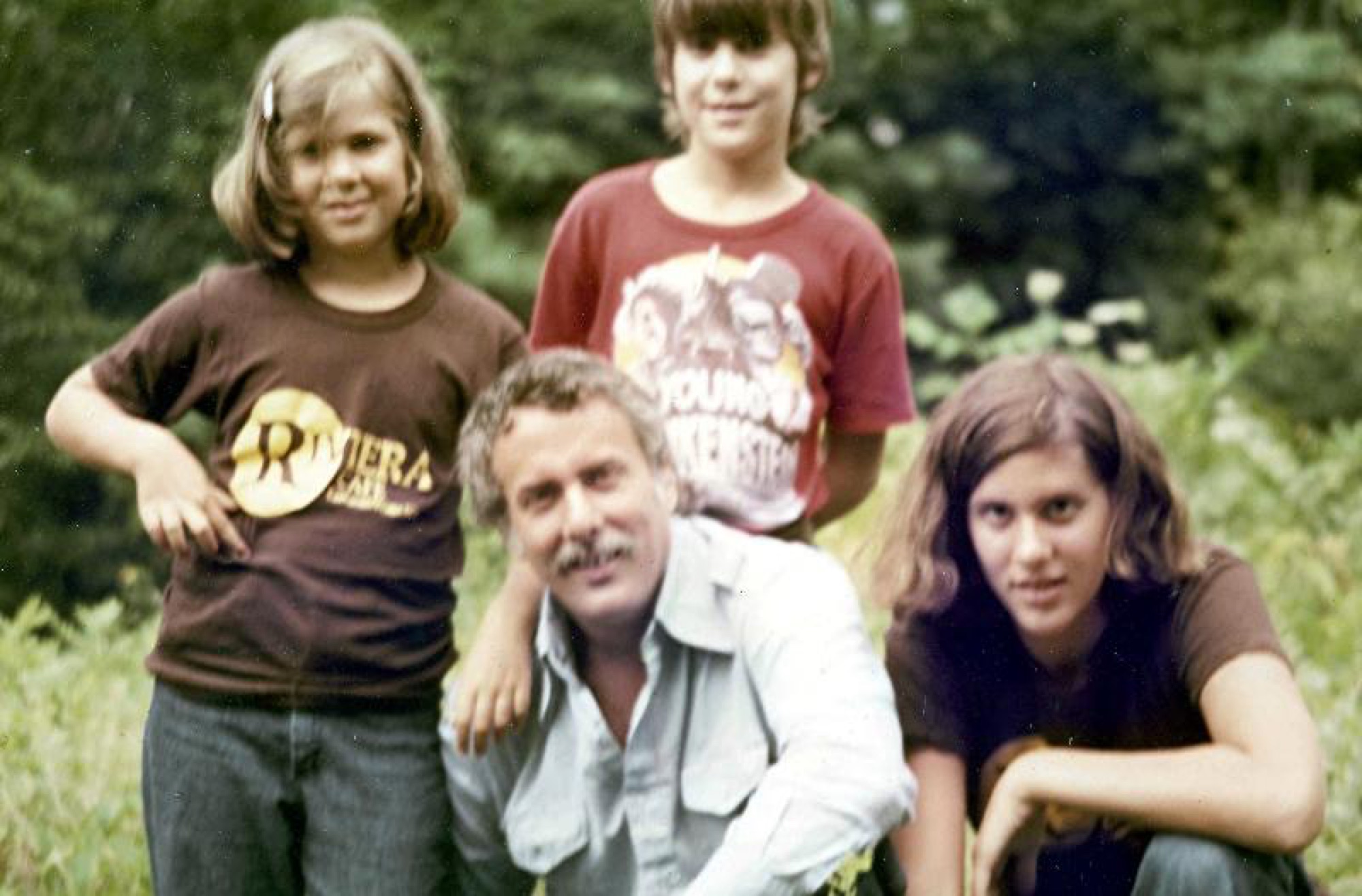 Marshall gathered outdoors with his children